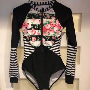 Beachkissed Bodysuit Rashguard Zip up Front Black and Pink Florals Built in Bra